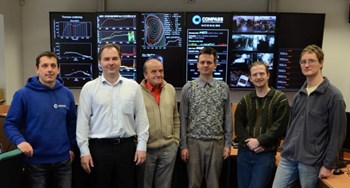 The core of the team behind (and in front of) H-mode success: from left to right, Filip Janky (tokamak control systems), Radomír Pánek (head of the Tokamak department), Jan Stöckel (senior physicist), Vladimír Weinzettl (plasma diagnostics), Jozef Varju (neutral beam), and Josef Havlíček (shift operator). (Click to view larger version...)
